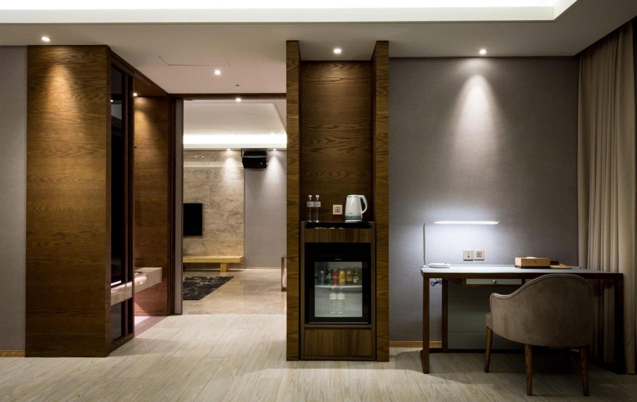 Cuncyue Hot Spring Resort Лодун Номер фото A room at the hotel